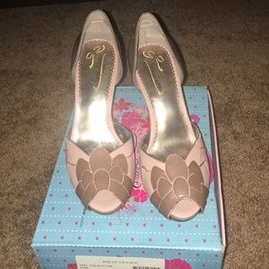 Poetic license peep toe pumps.